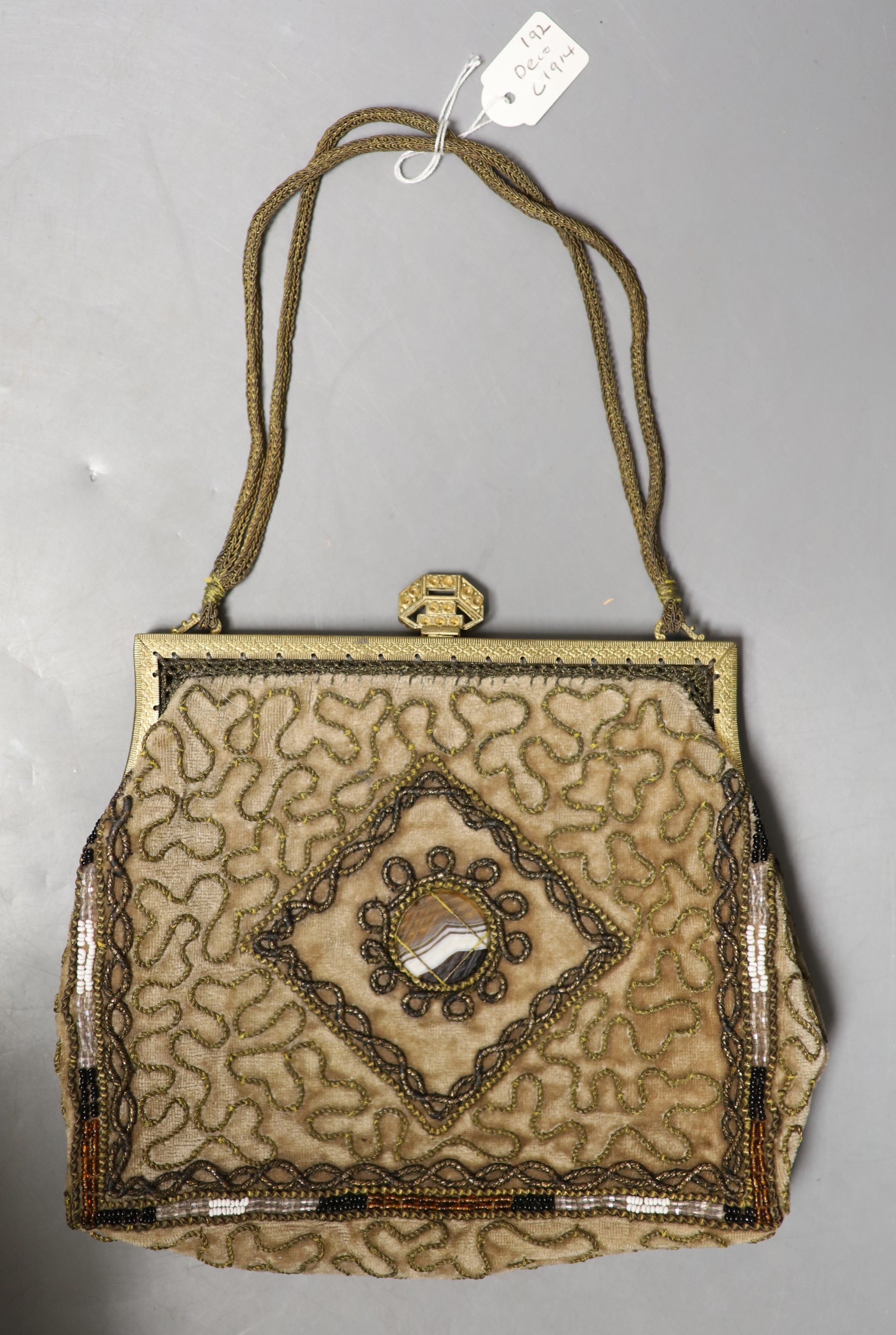 A collection of approximately fifty Victorian and later beadwork, white metal and fabric purses etc.